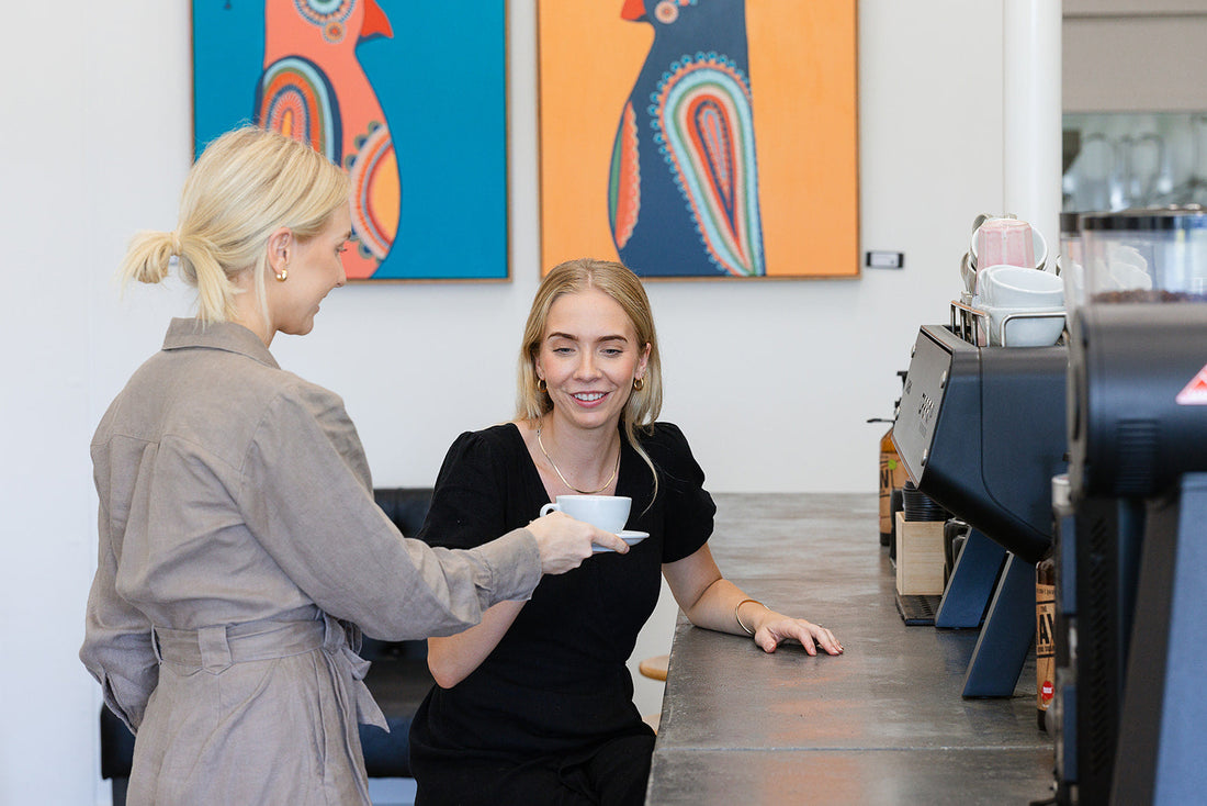 Moon Boy Roast House founders in the roastery